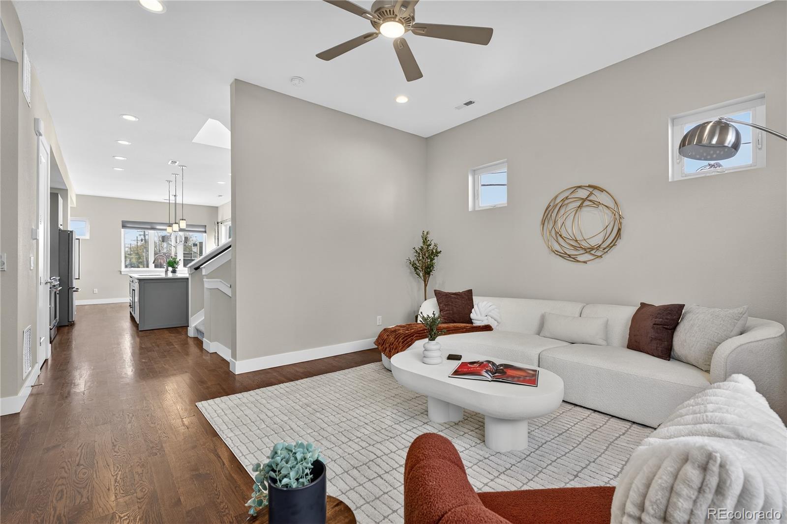 925 Inca Street, Unit 7 Denver, CO 80204 - Photo 12 of 42 a living room with furniture and kitchen view