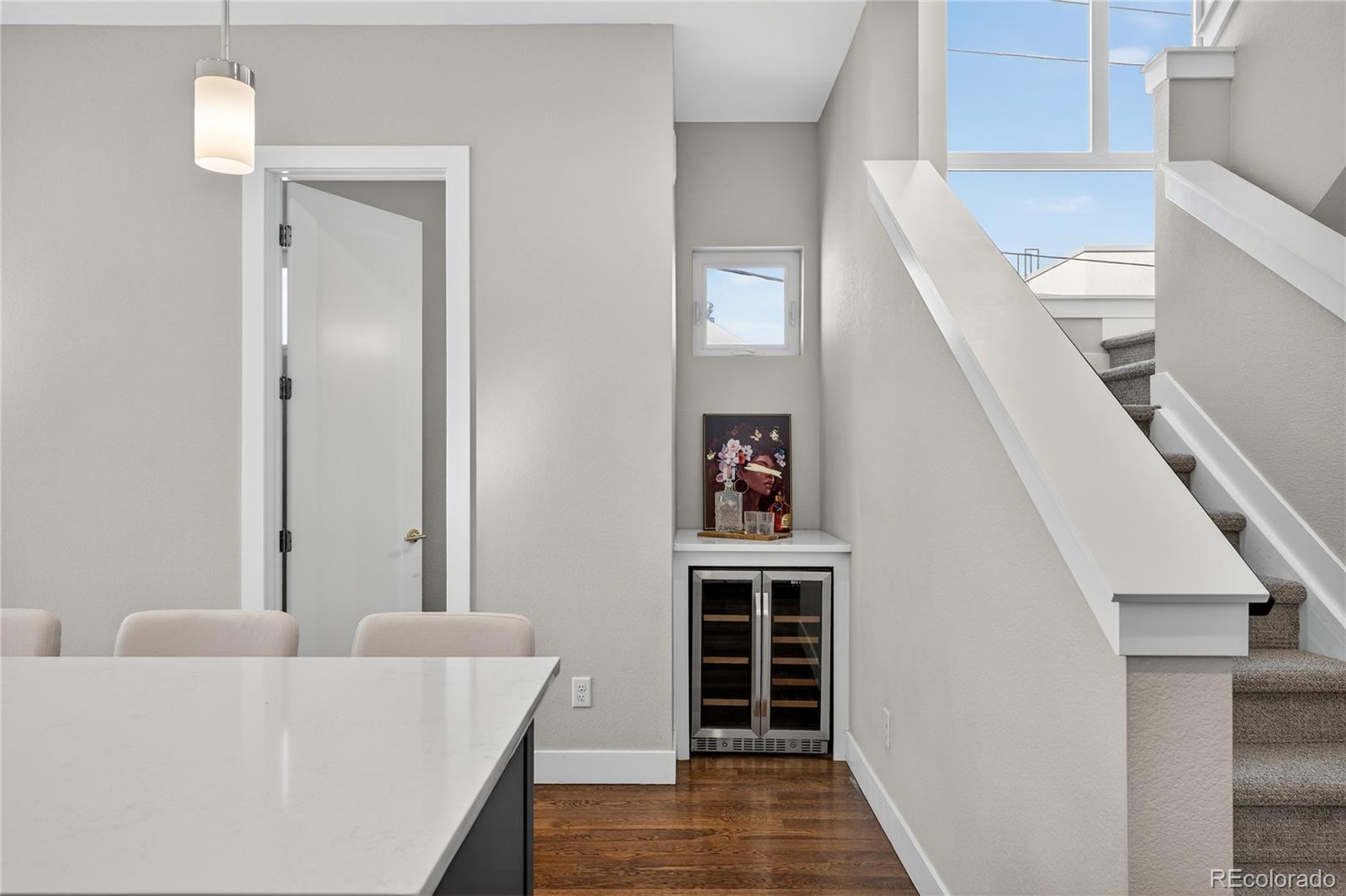 925 Inca Street, Unit 7 Denver, CO 80204 - Photo 18 of 42 a living room with furniture and a window