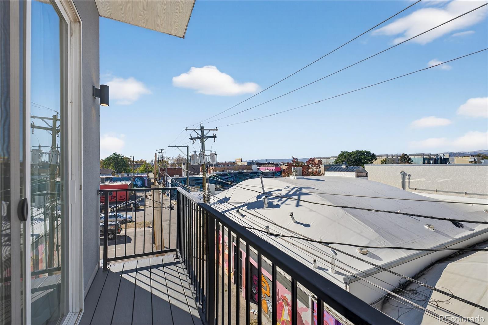 925 Inca Street, Unit 7 Denver, CO 80204 - Photo 28 of 42 a city view from a balcony