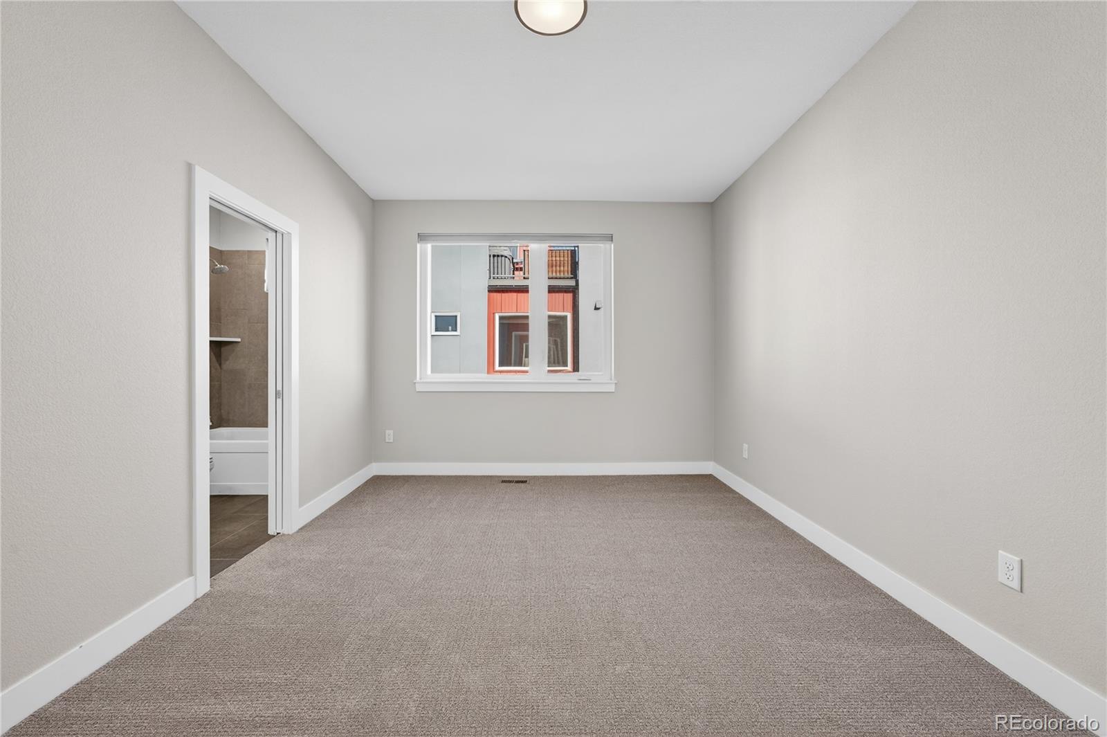 925 Inca Street, Unit 7 Denver, CO 80204 - Photo 29 of 42 an empty room with windows