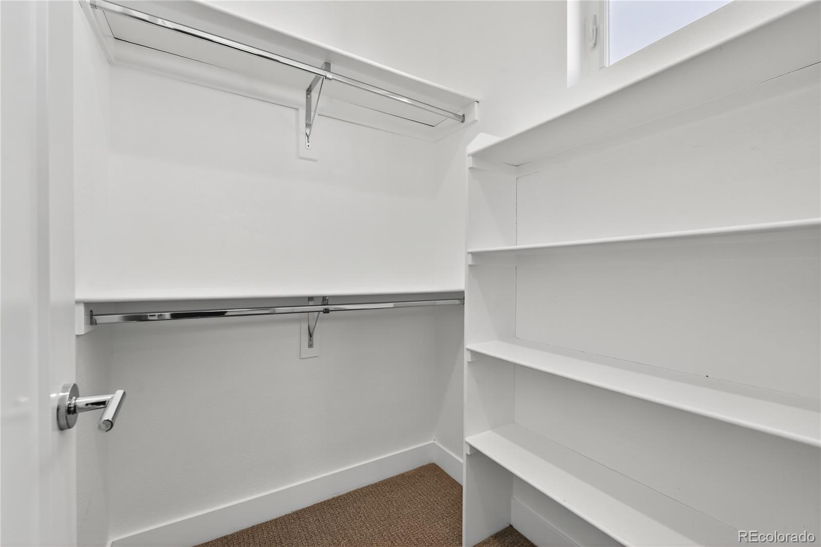925 Inca Street, Unit 7 Denver, CO 80204 - Photo 32 of 42 a view of a room with shelf on the wall