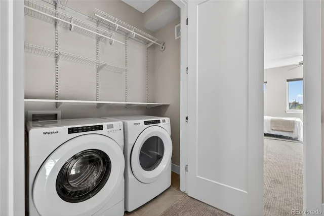a utility room with dryer and washer