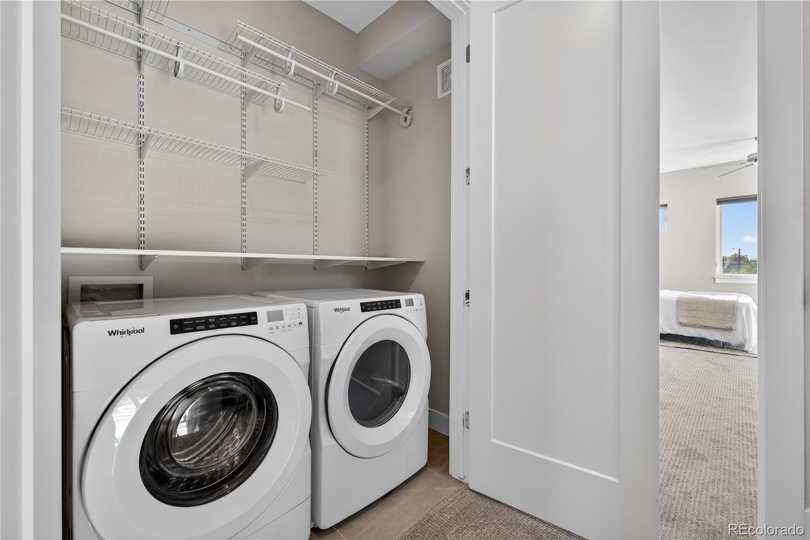 925 Inca Street, Unit 7 Denver, CO 80204 - Photo 33 of 42 a utility room with dryer and washer
