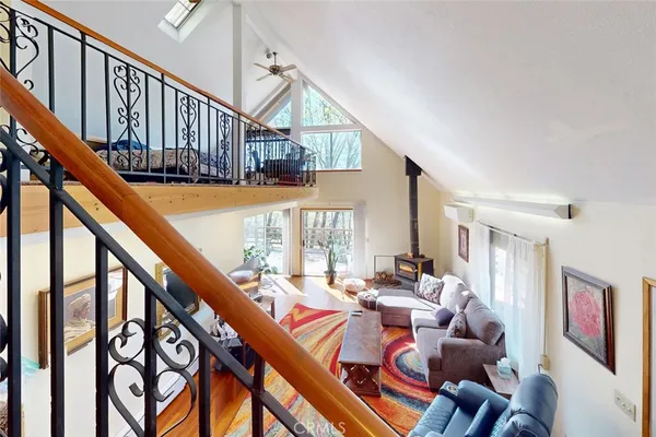 a bed room with furniture and stairs