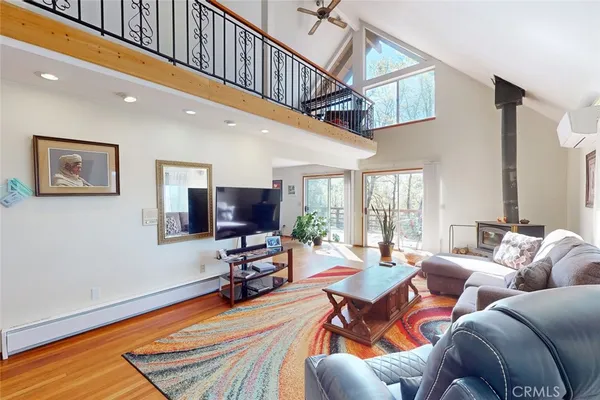 a bedroom with bed and a window