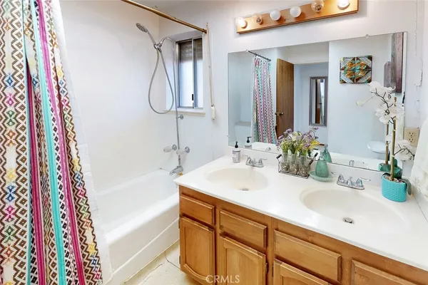a bathroom with a toilet and a bathtub
