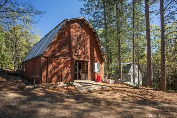 a bathroom with a sink a mirror and a window