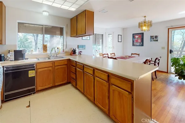 a bed room with furniture and a flat screen tv