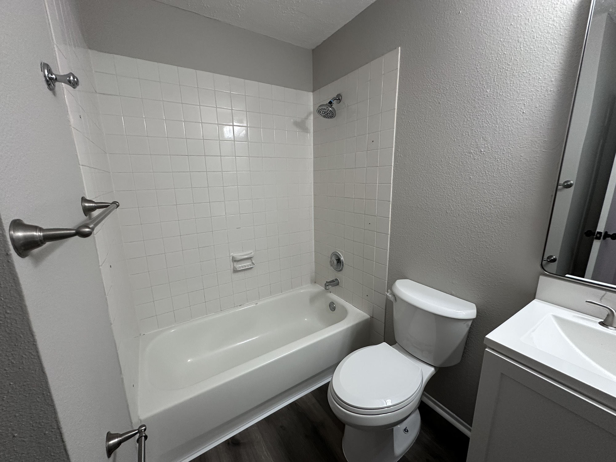 3130 Cottonshire Drive Spring, TX 77373 - Photo 21 of 32 a white toilet sitting next to a bath tub