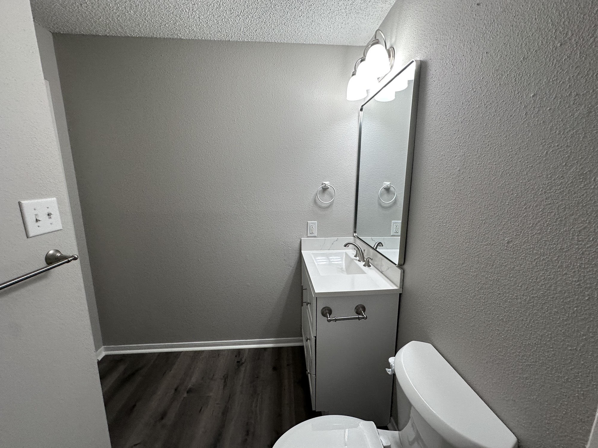 3130 Cottonshire Drive Spring, TX 77373 - Photo 26 of 32 a bathroom with a toilet sink and mirror