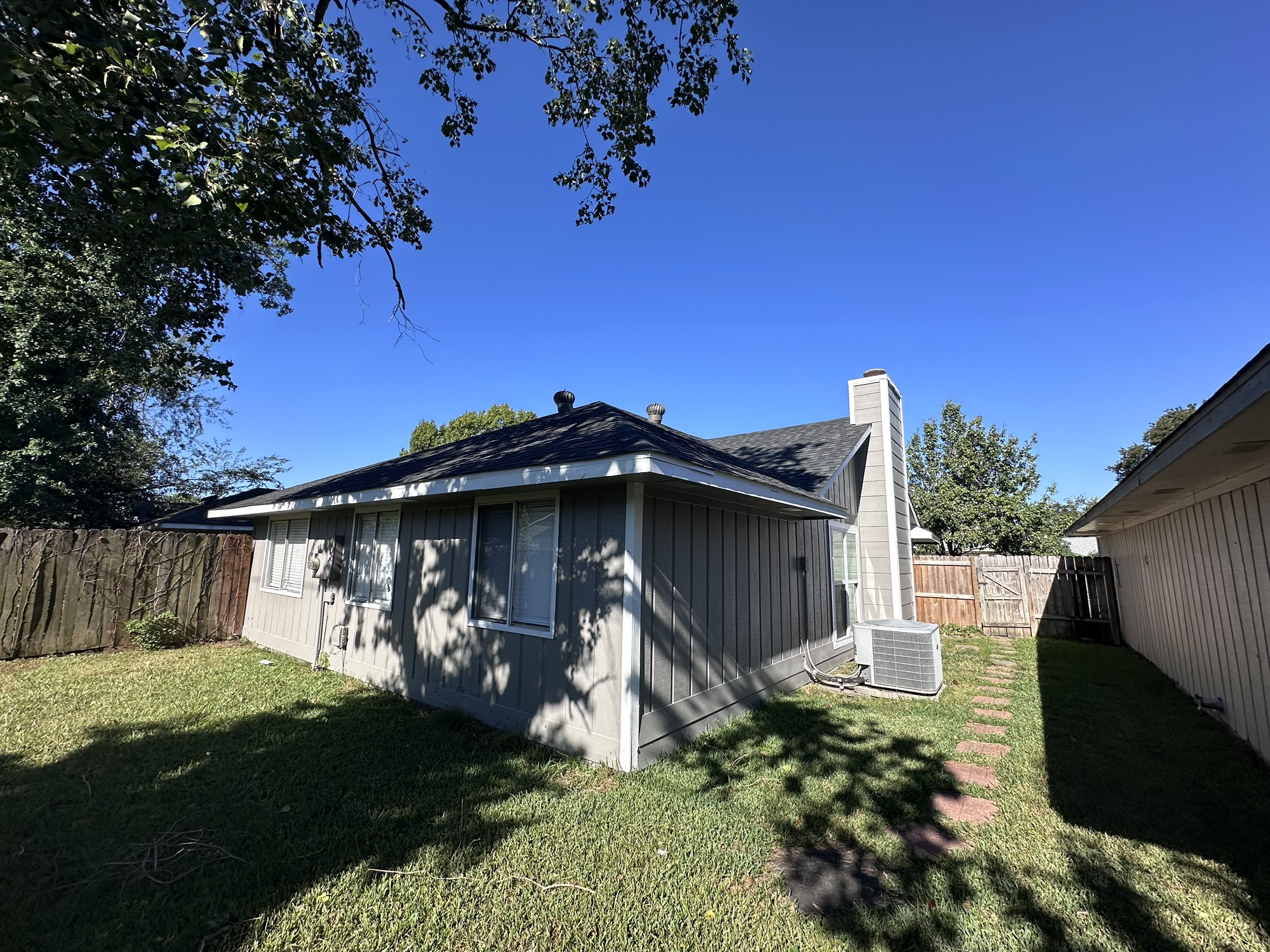 3130 Cottonshire Drive Spring, TX 77373 - Photo 29 of 32 a view of a wooden house with a yard