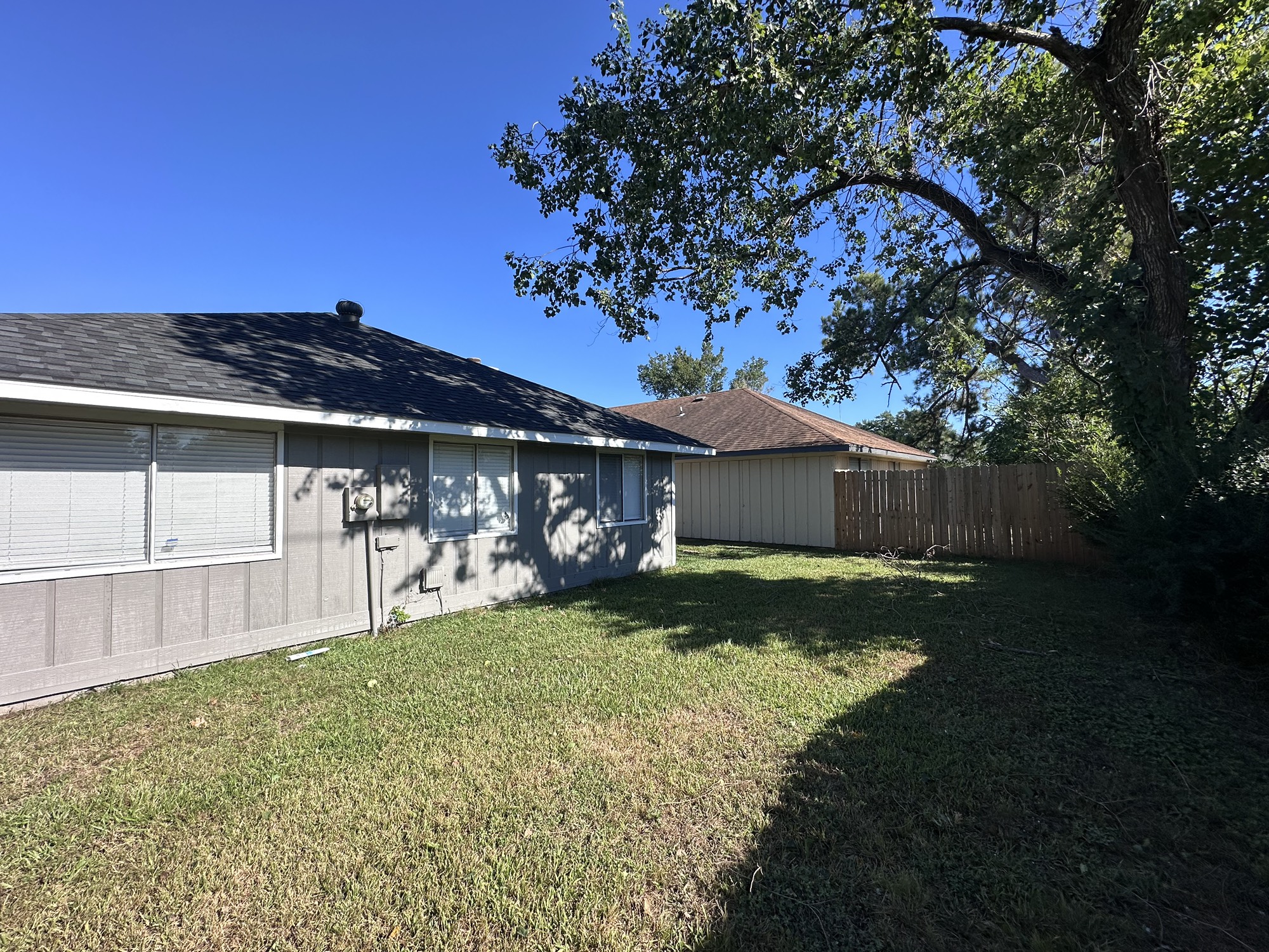 3130 Cottonshire Drive Spring, TX 77373 - Photo 31 of 32 a view of a house with a back yard