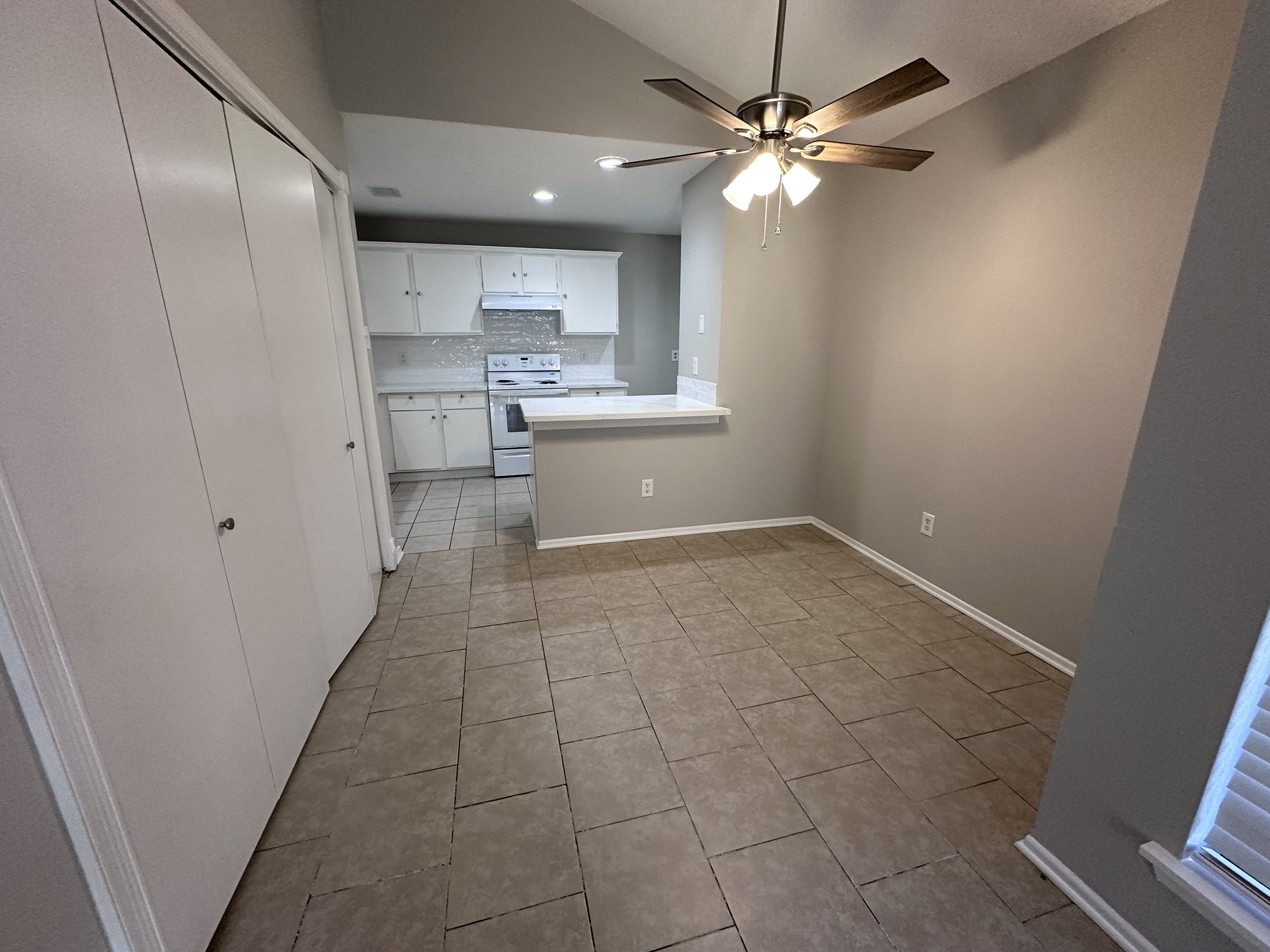 3130 Cottonshire Drive Spring, TX 77373 - Photo 9 of 32 a view of a kitchen with a sink and a window
