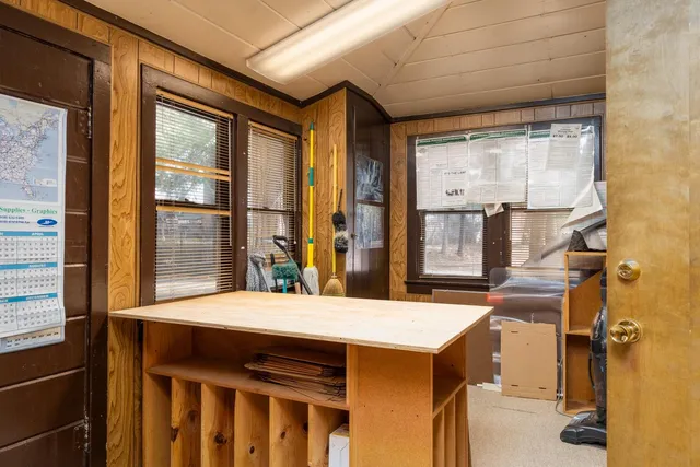 a room with a table and chairs