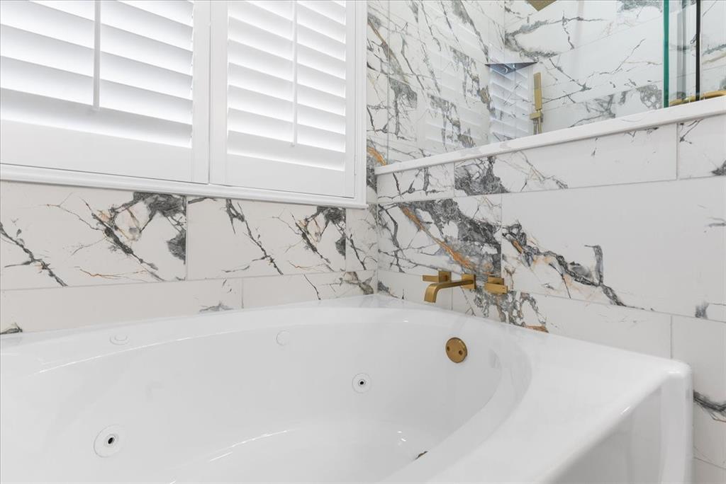 3701 Regency Circle Fort Worth, TX 76137 - Photo 18 of 31 a bathroom with a sink and vanity