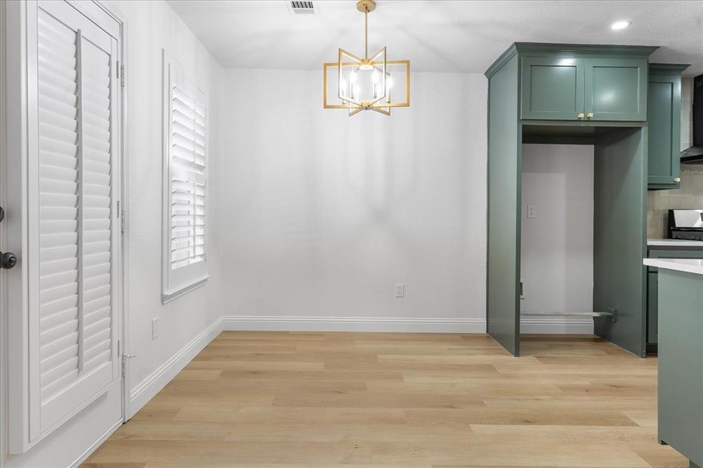 3701 Regency Circle Fort Worth, TX 76137 - Photo 4 of 31 a view of an empty room with window and stairs