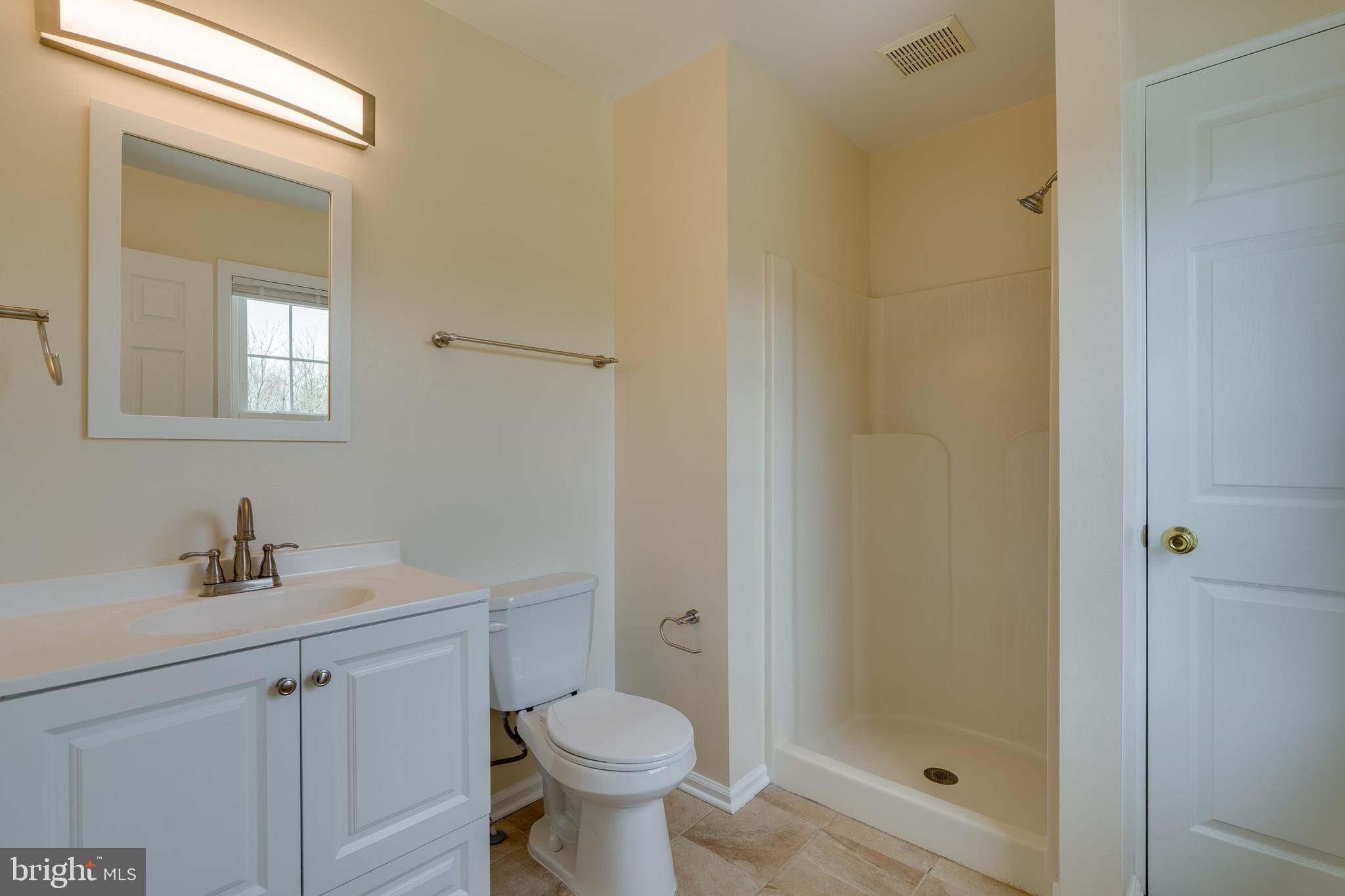 25 Tupelo Street Lititz, PA 17543 - Photo 16 of 20 a bathroom with a sink toilet and shower