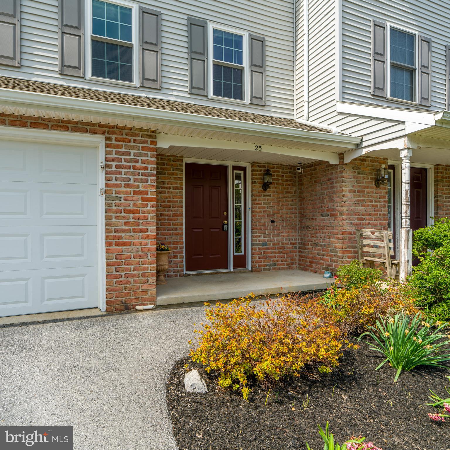 25 Tupelo Street Lititz, PA 17543 - Photo 2 of 20 front view of a brick house with a large window