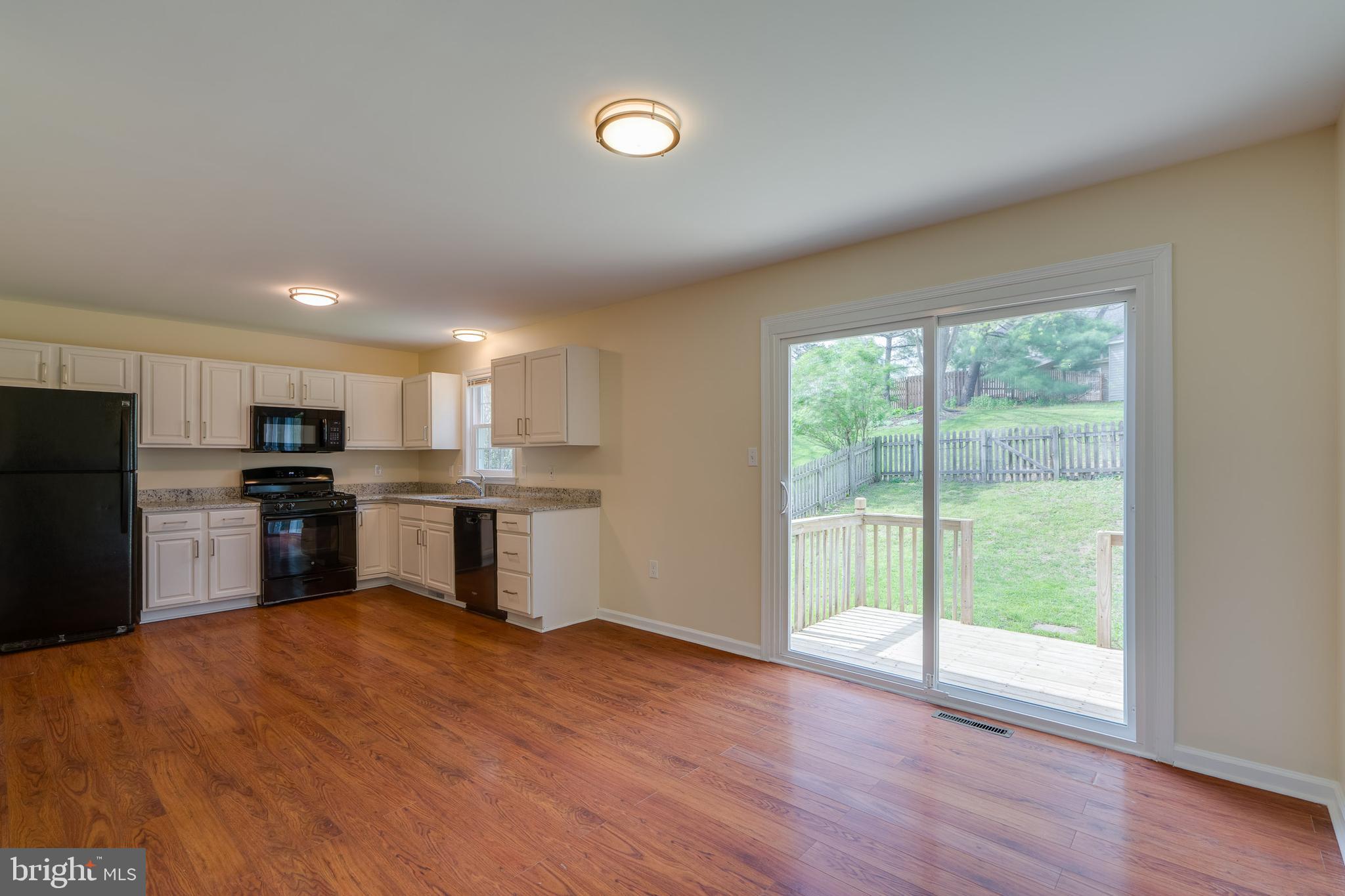 25 Tupelo Street Lititz, PA 17543 - Photo 9 of 20 a kitchen with a refrigerator and a stove top oven