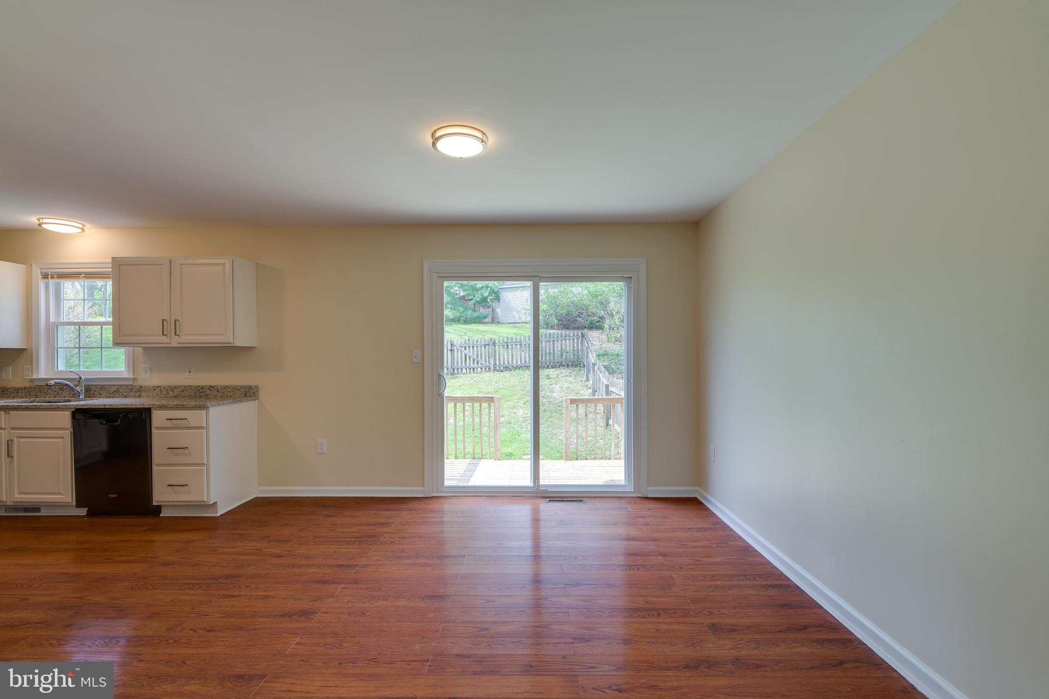 25 Tupelo Street Lititz, PA 17543 - Photo 10 of 20 a view of an empty room with wooden floor and a window