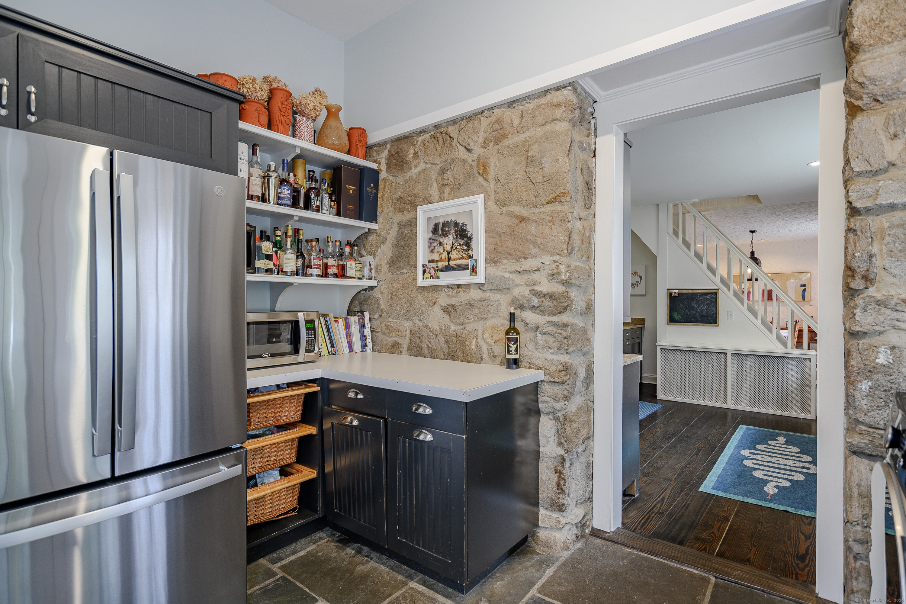 58 Woodchuck Lane Ridgefield, CT 06877 - Photo 20 of 38 a kitchen with stainless steel appliances granite countertop a refrigerator and a stove