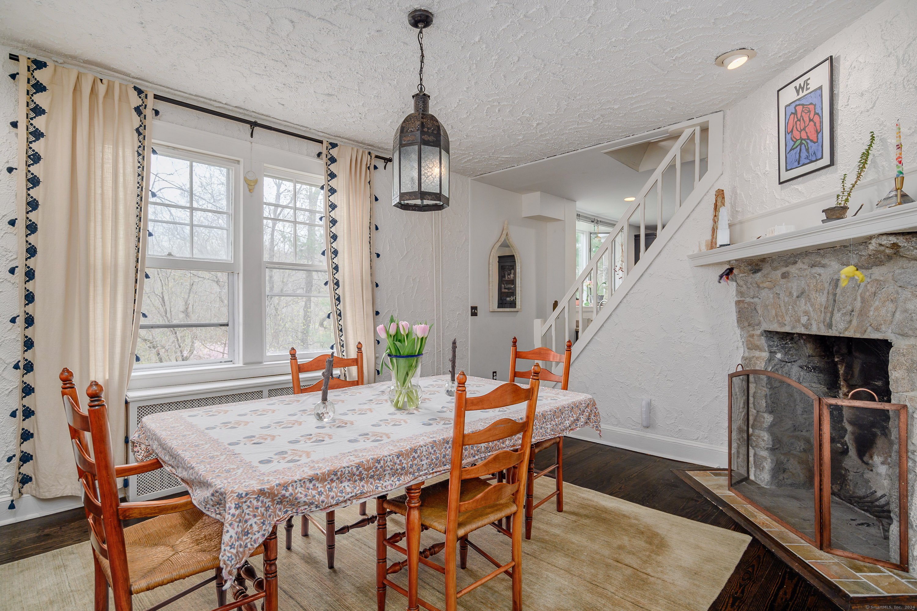 58 Woodchuck Lane Ridgefield, CT 06877 - Photo 22 of 38 a view of a dining room with furniture window and wooden floor