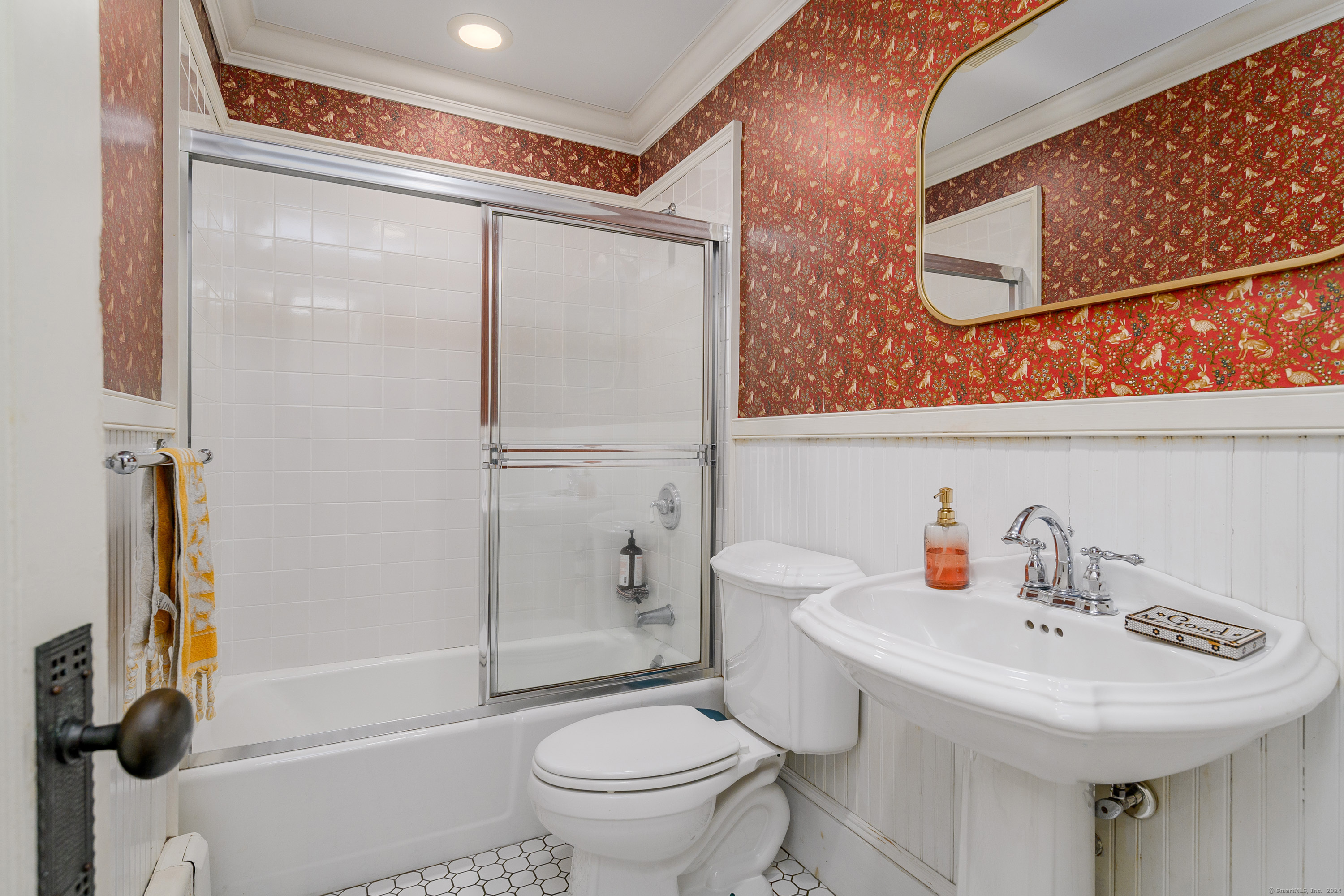 58 Woodchuck Lane Ridgefield, CT 06877 - Photo 25 of 38 a bathroom with a sink toilet and shower