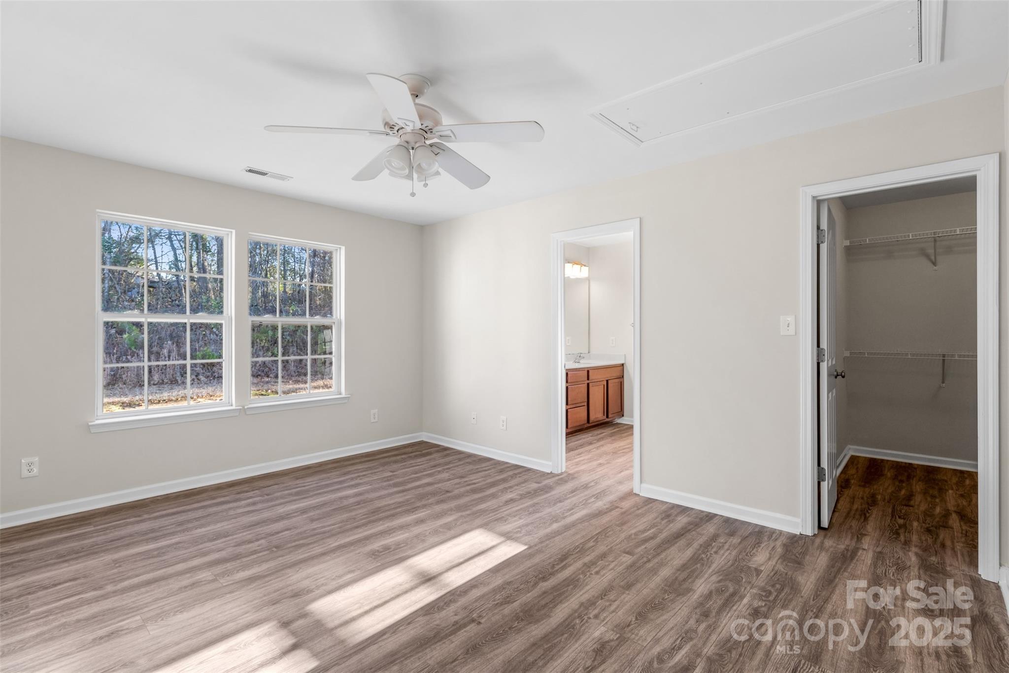 3065 Georgetown Road Lancaster, SC 29720 - Photo 17 of 26 a view of an empty room with wooden floor and a window