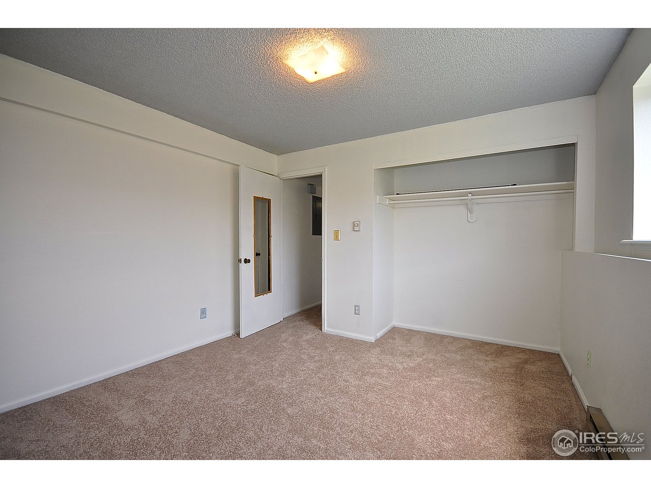 2628 Redwing Road, Unit 2A Fort Collins, CO 80526 - Photo 9 of 16 a view of an empty room