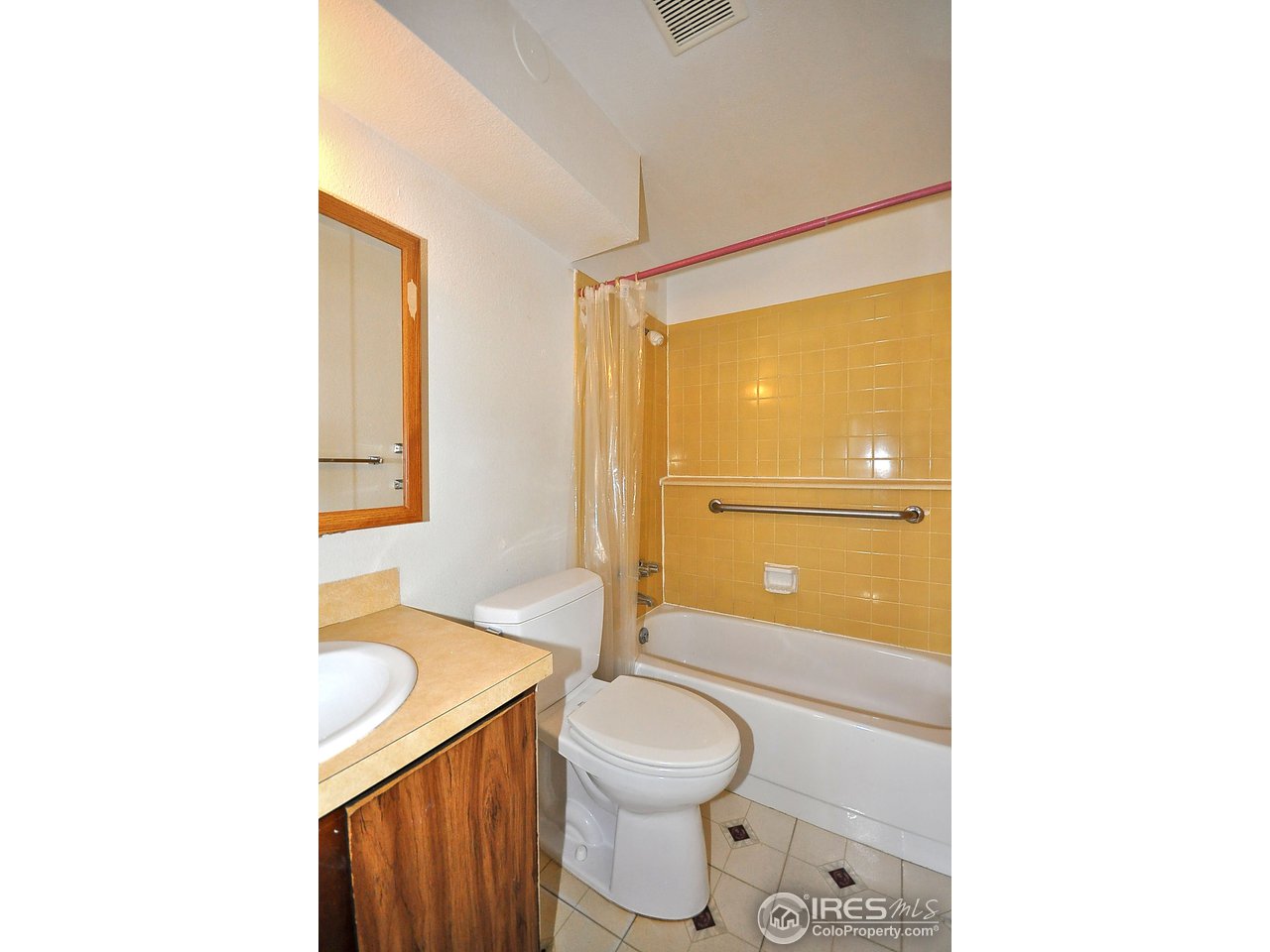 2628 Redwing Road, Unit 2A Fort Collins, CO 80526 - Photo 10 of 16 a bathroom with a sink a toilet and shower
