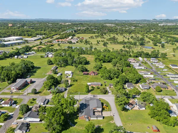 a view of lake with green space
