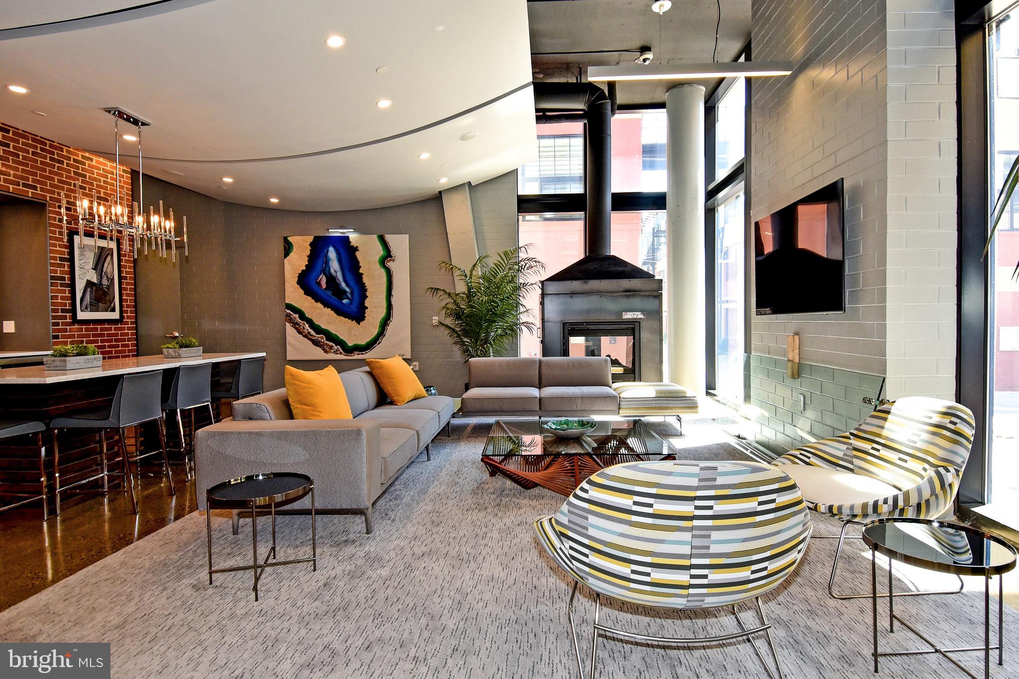 2125 14th Street Northwest, Unit 214 Washington, DC 20009 - Photo 5 of 28 Common Lounge area with Fireplace