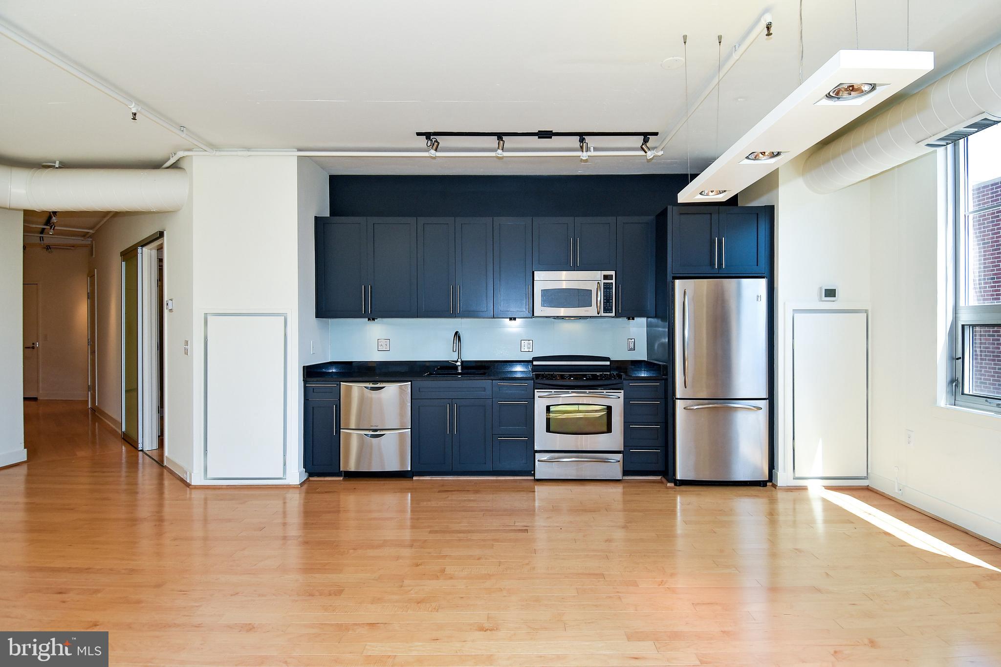 2125 14th Street Northwest, Unit 214 Washington, DC 20009 - Photo 8 of 28 Open Living-Dining-Kitchen