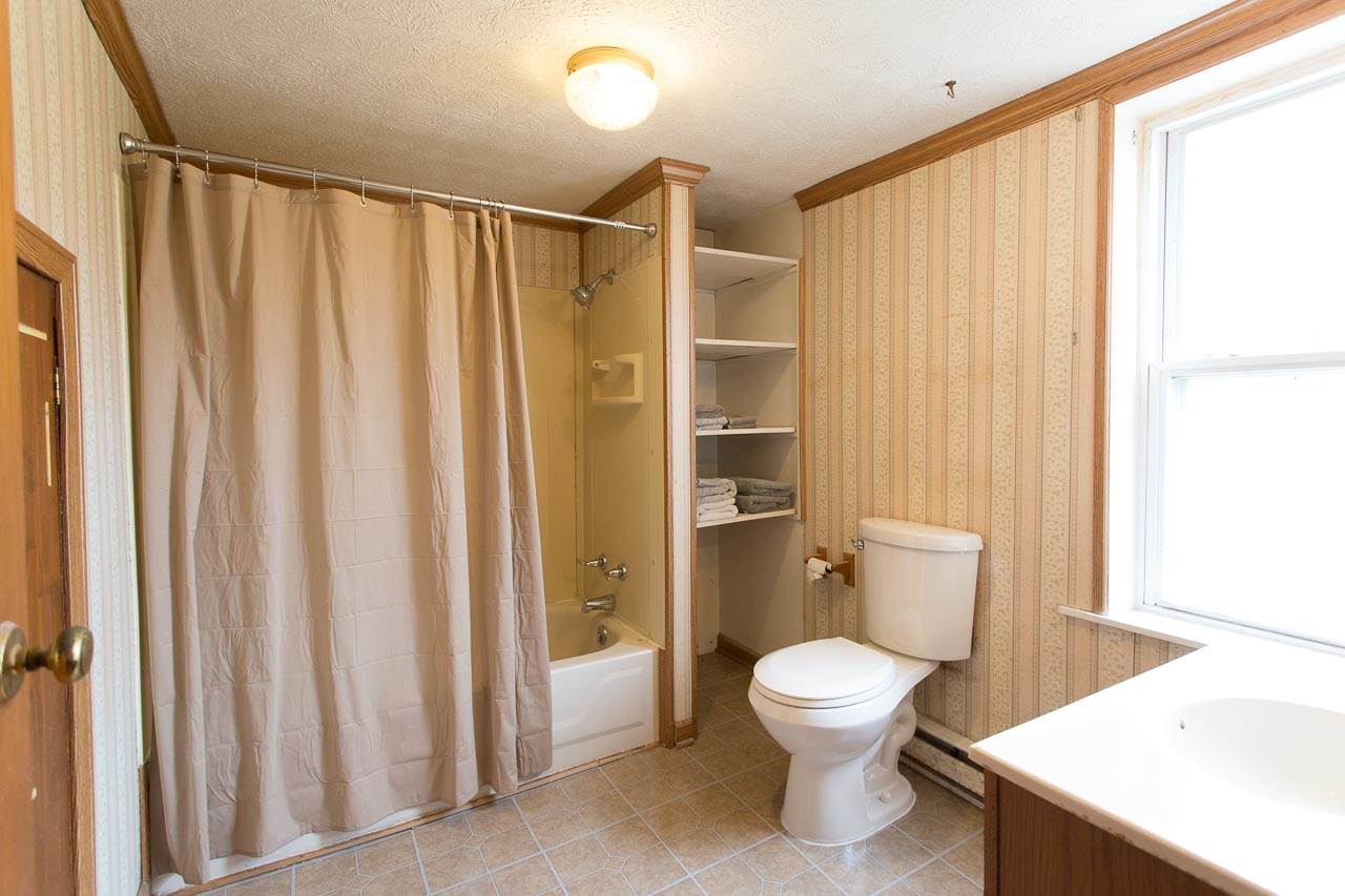 2001 Spitzer Road Broadway, VA 22815 - Photo 30 of 38 a bathroom with a toilet a sink and a shower