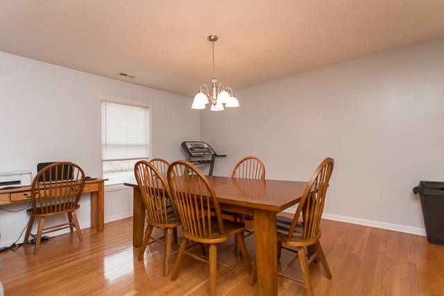 2001 Spitzer Road Broadway, VA 22815 - Photo 6 of 38 a view of a dining room with furniture and wooden floor