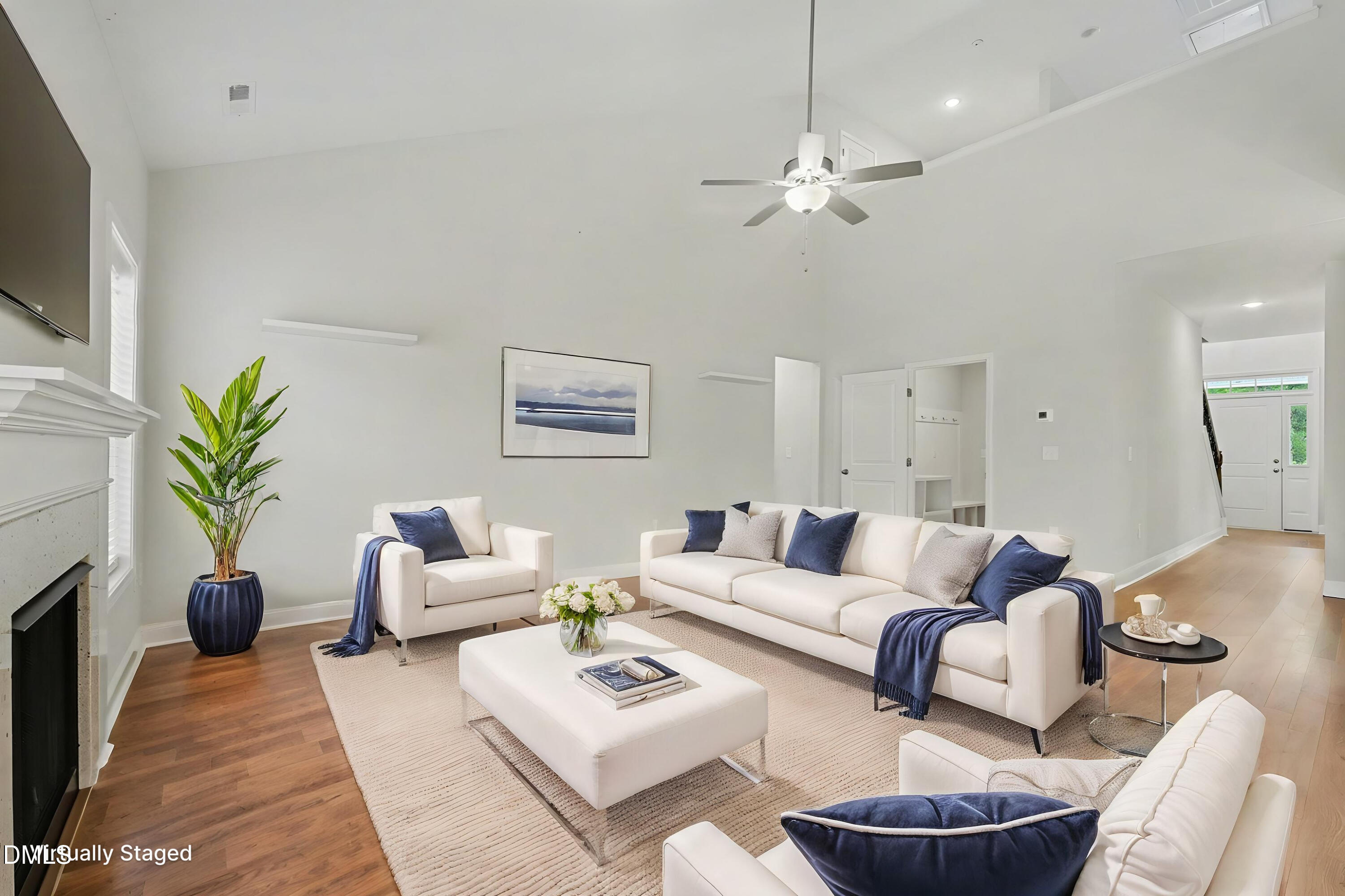 2815 Lemuel Black Road Spring Lake, NC 28390 - Photo 2 of 37 a living room with furniture and a chandelier
