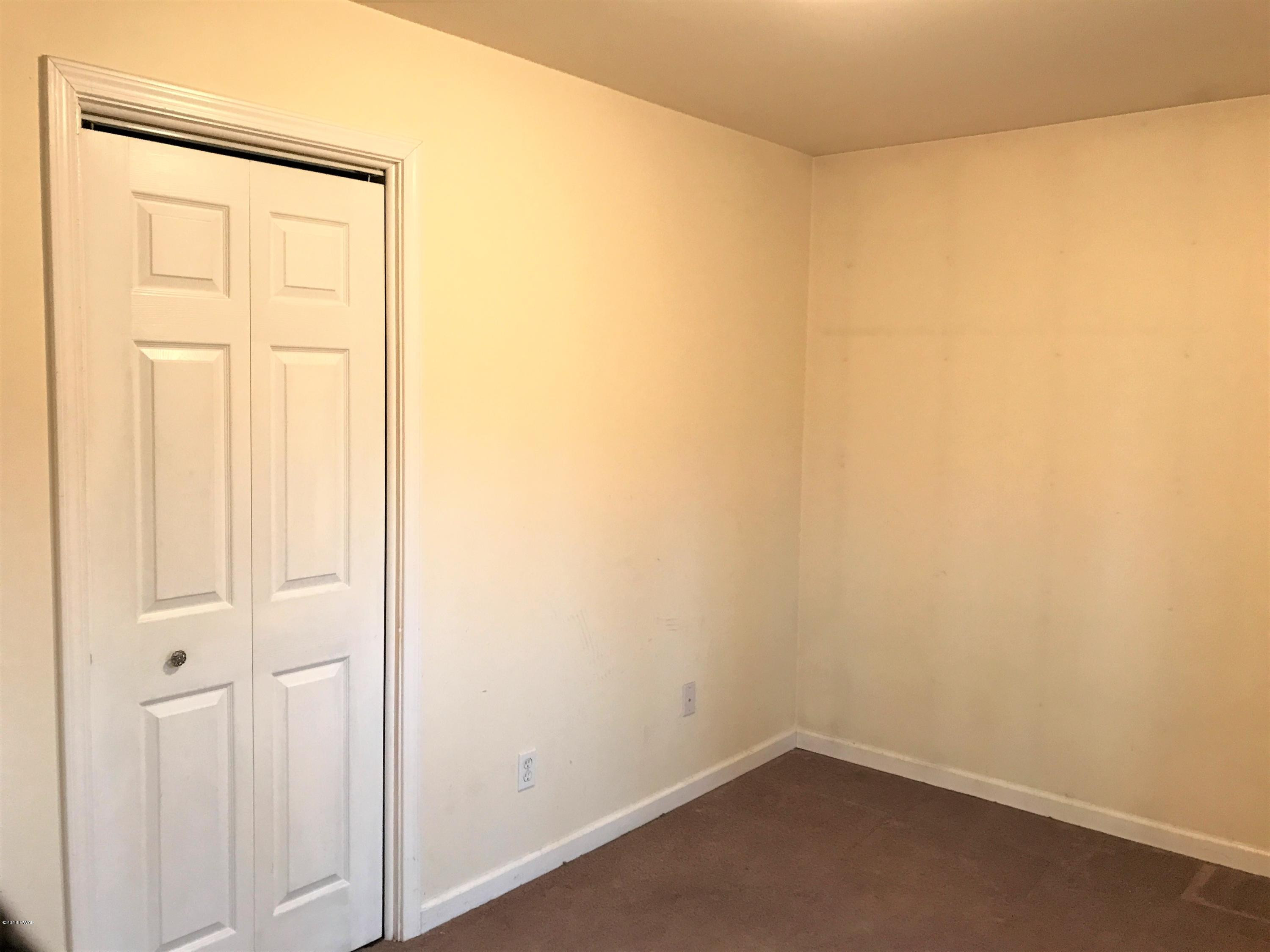151 Raccoon Road Dingmans Ferry, PA 18328 - Photo 20 of 29 wooden floor in a empty room