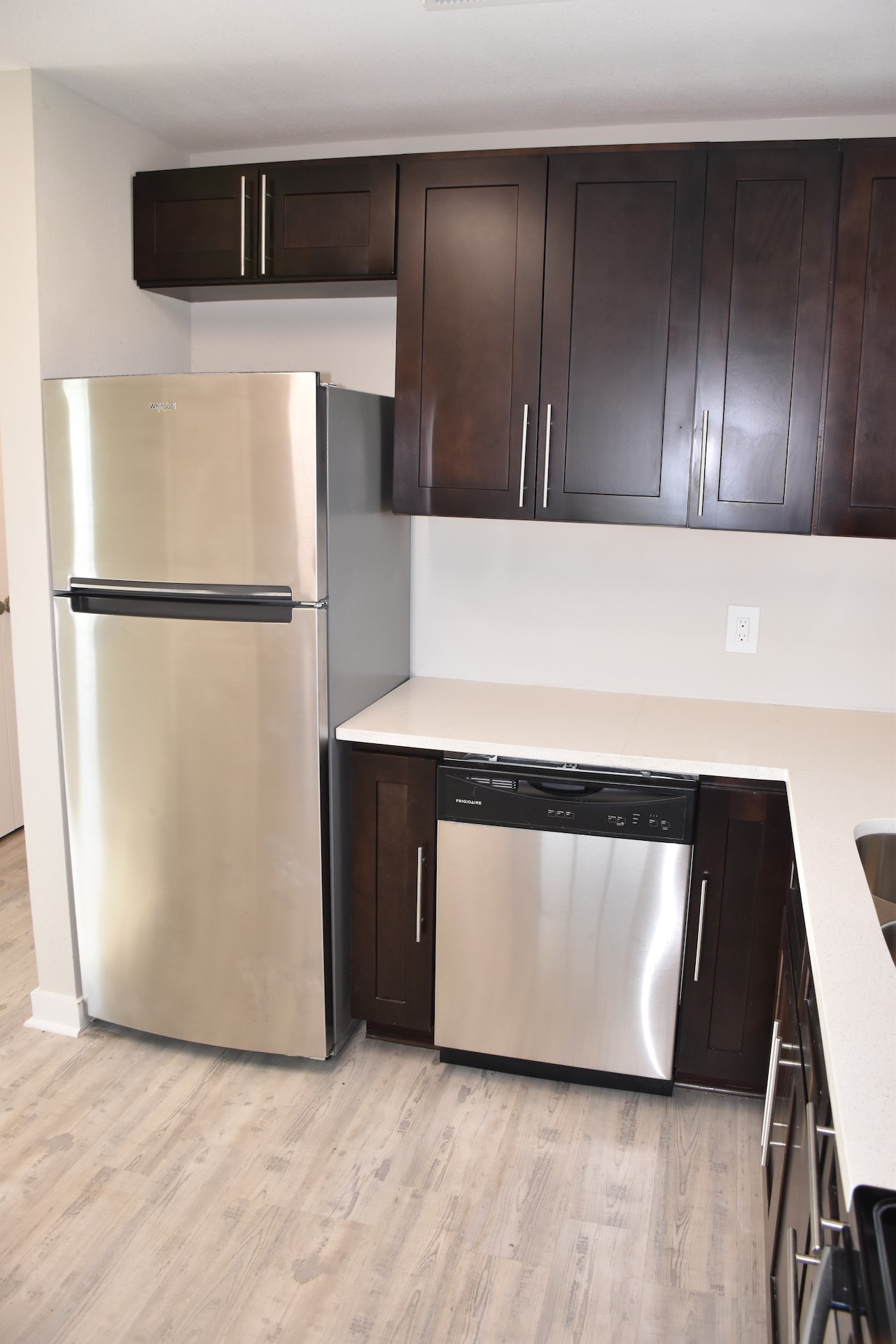 3751 County Road 463 Elgin, TX 78621 - Photo 12 of 27 a white refrigerator freezer sitting in a kitchen