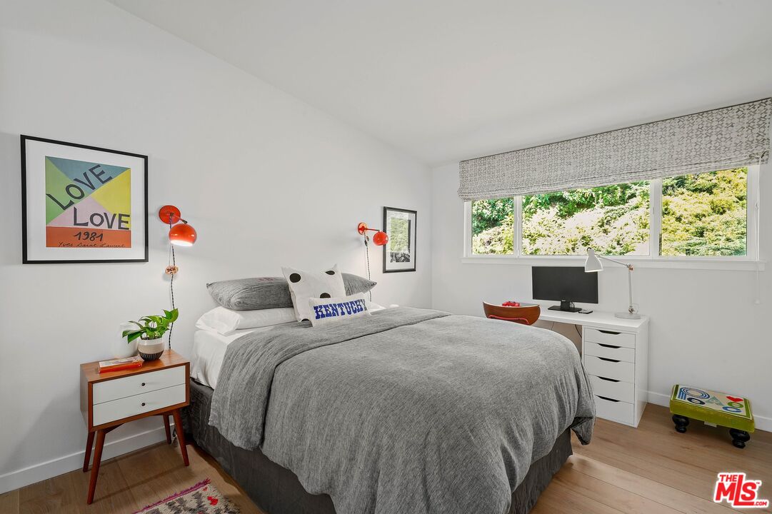 3516 Shoreheights Drive Malibu, CA 90265 - Photo 23 of 29 a bedroom with a bed and a window