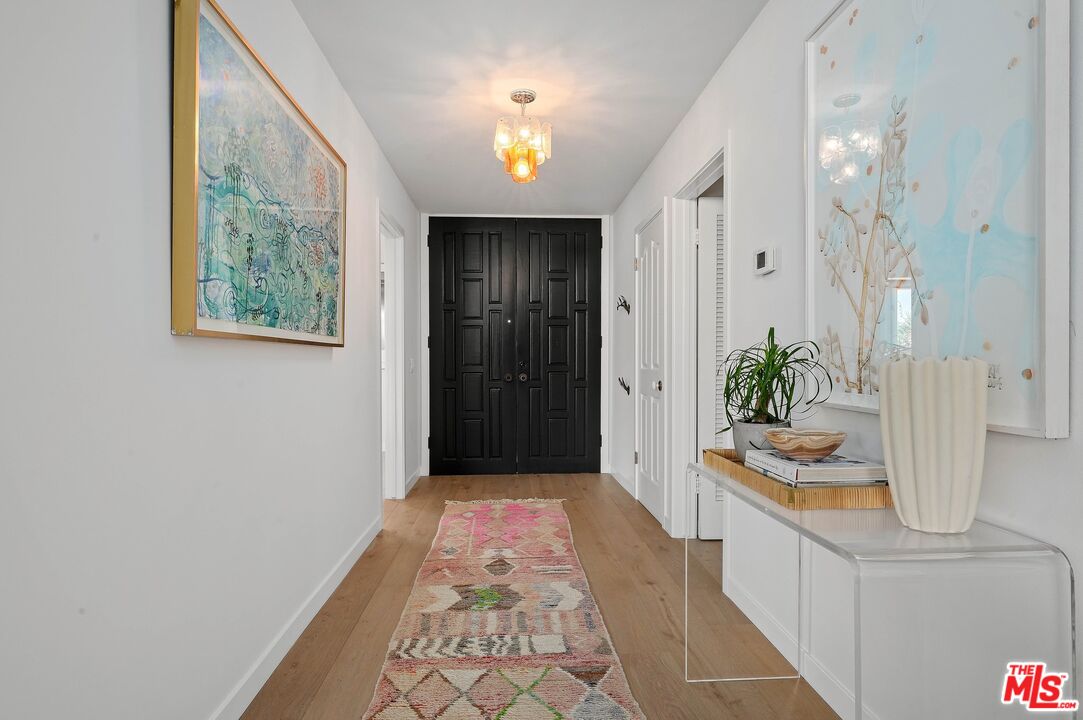 3516 Shoreheights Drive Malibu, CA 90265 - Photo 3 of 29 a spacious bathroom with a granite countertop sink a mirror and shower