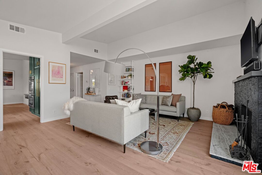 3516 Shoreheights Drive Malibu, CA 90265 - Photo 7 of 29 a living room with furniture and a flat screen tv