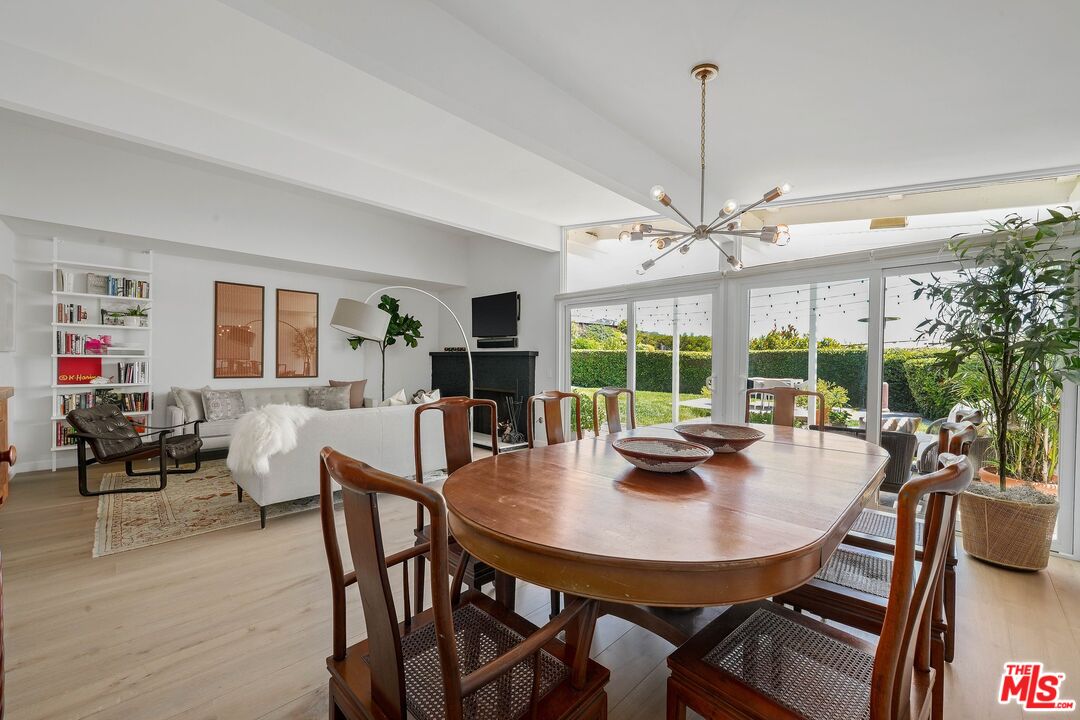 3516 Shoreheights Drive Malibu, CA 90265 - Photo 10 of 29 a view of a dining room with furniture window and outside view