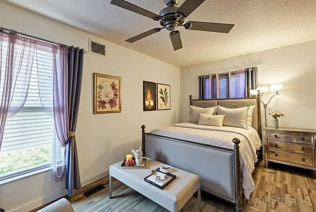 a view of a house with patio and sitting area