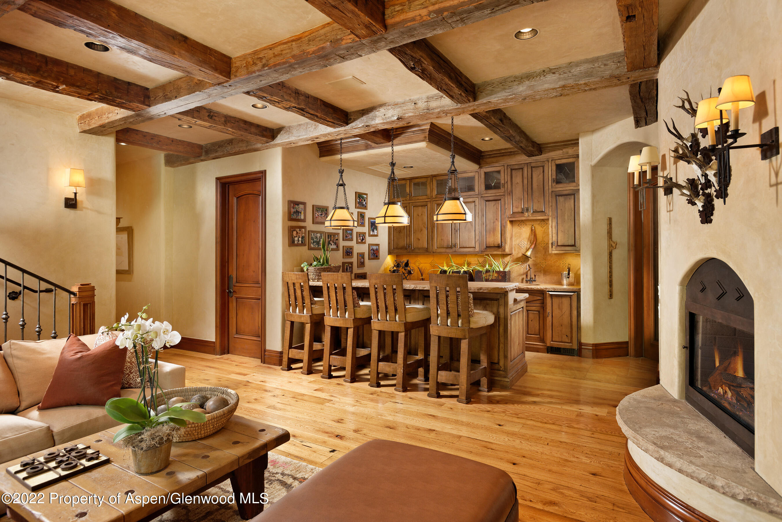 1225 Riverside Drive Aspen, CO 81611 - Photo 12 of 21 a living room with lots of furniture and gym equipment