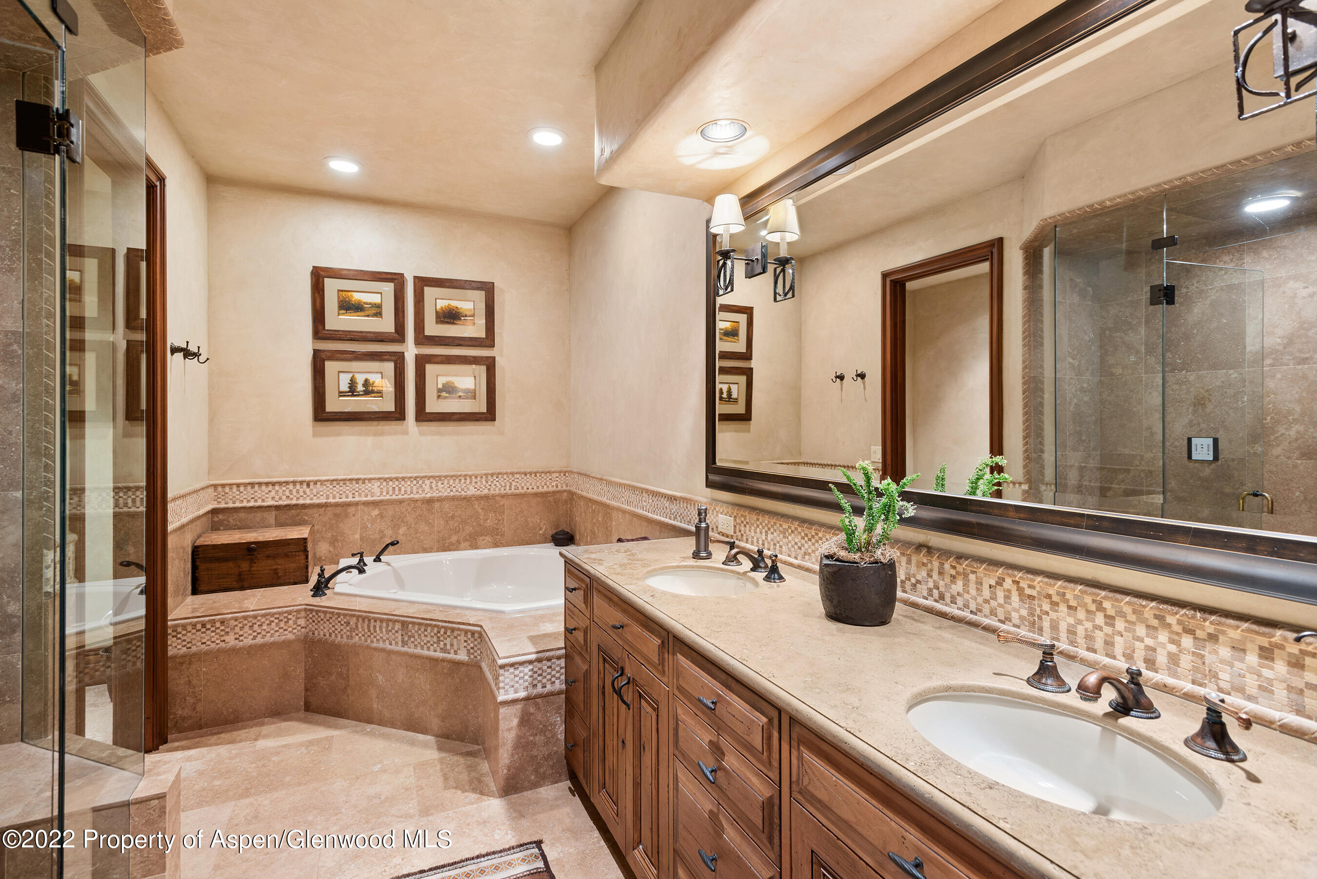 1225 Riverside Drive Aspen, CO 81611 - Photo 17 of 21 a bathroom with a tub sink and mirror