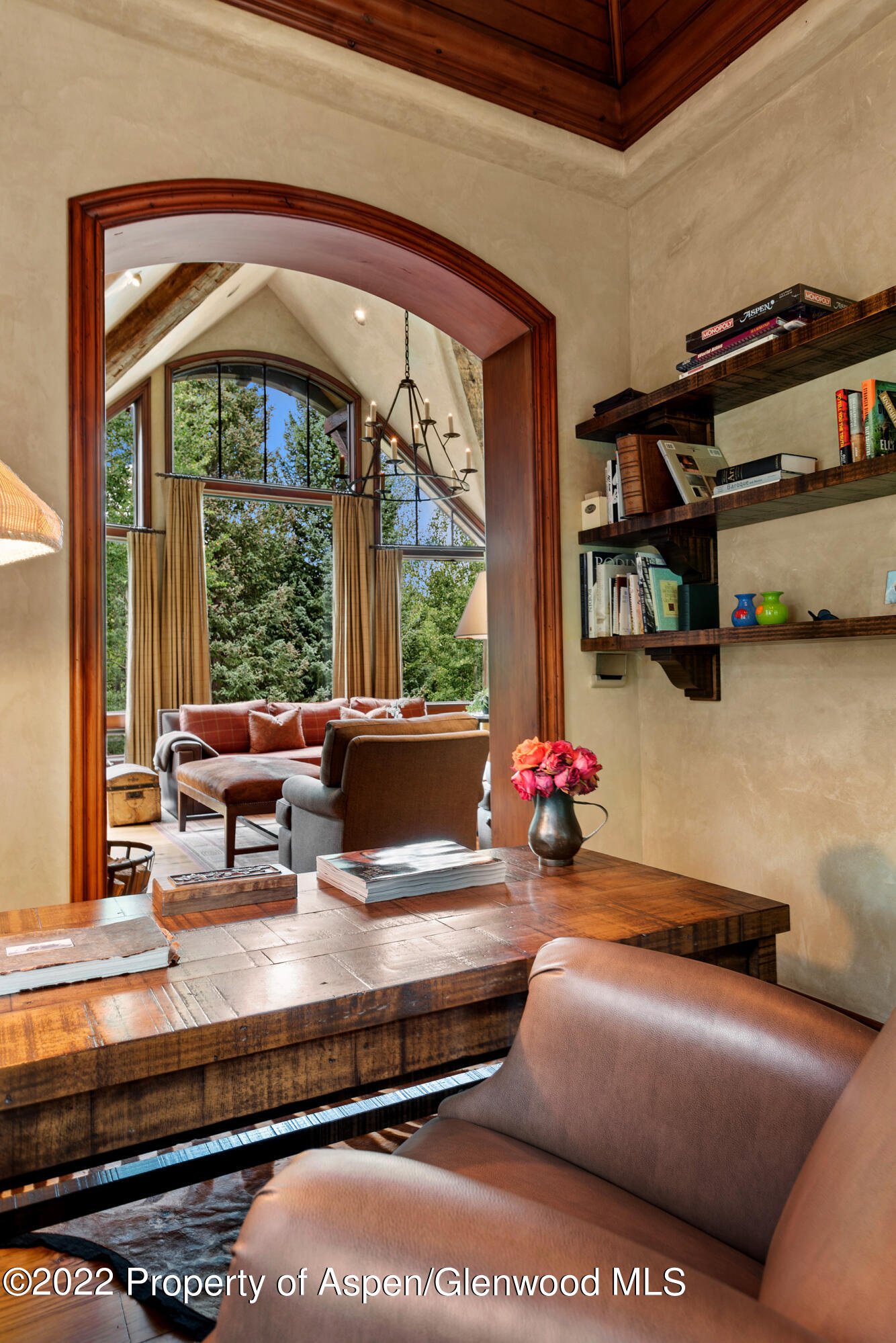 1225 Riverside Drive Aspen, CO 81611 - Photo 10 of 21 a living room with furniture and a floor to ceiling window