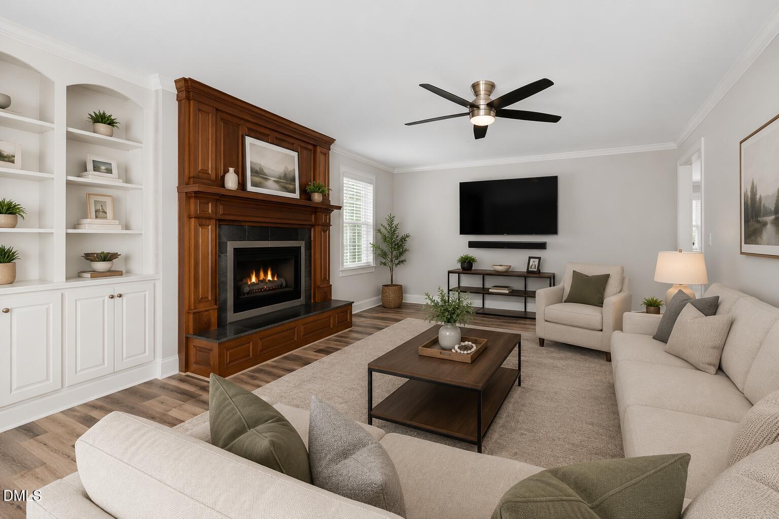 726 Thomas Road Rocky Mount, NC 27801 - Photo 7 of 55 a living room with furniture a flat screen tv and a fireplace