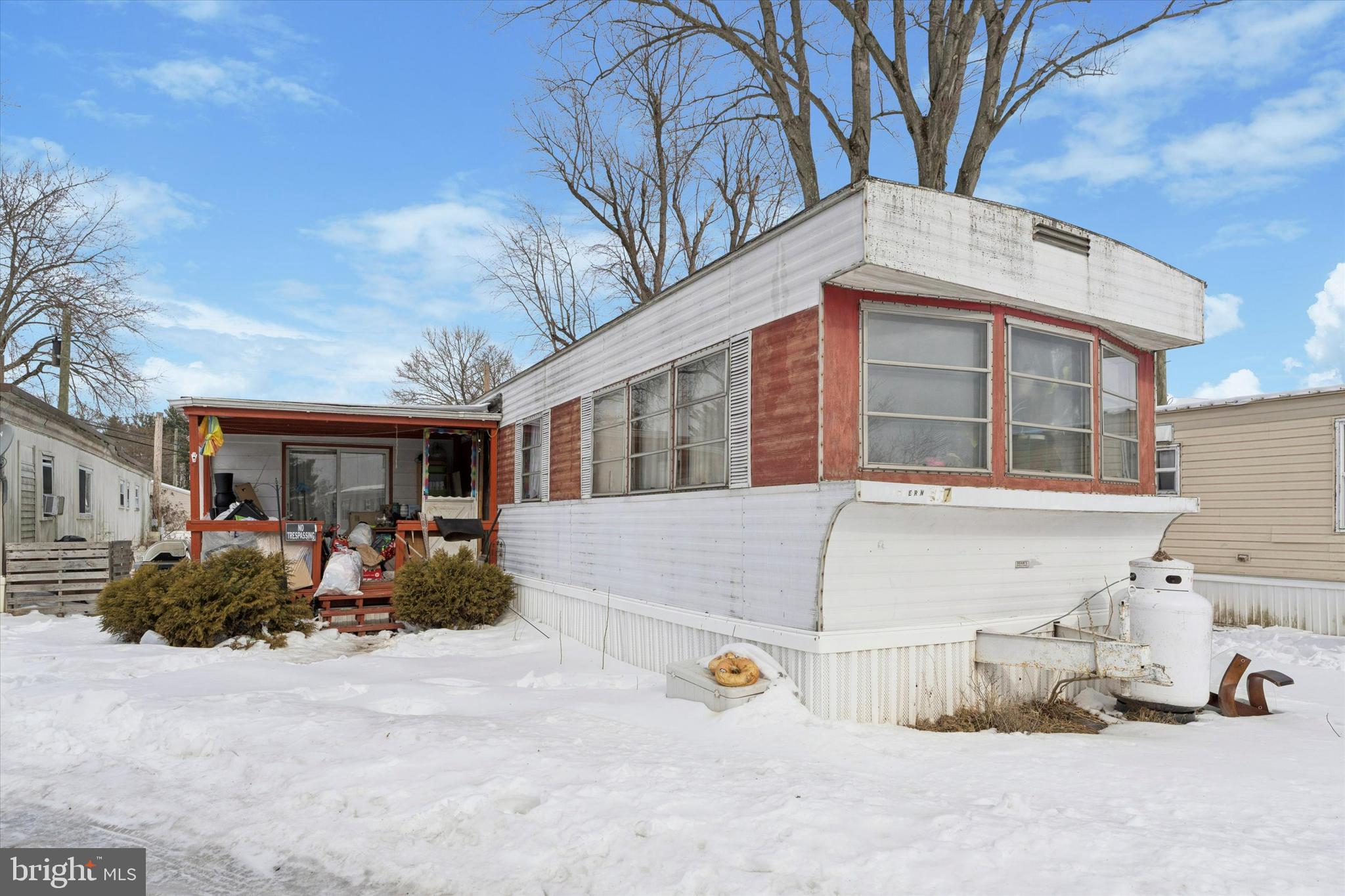 165 West Ridge Pike, Unit 217 Limerick, PA 19468 - Photo 2 of 7 a front view of a house with outdoor space