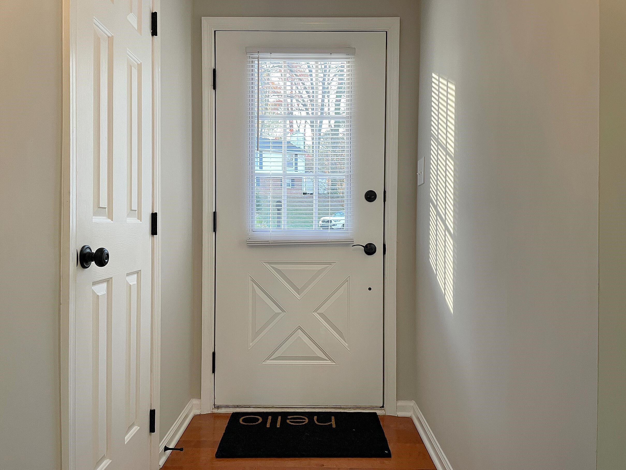 7328 Summerland Drive Raleigh, NC 27612 - Photo 2 of 27 a view of front door