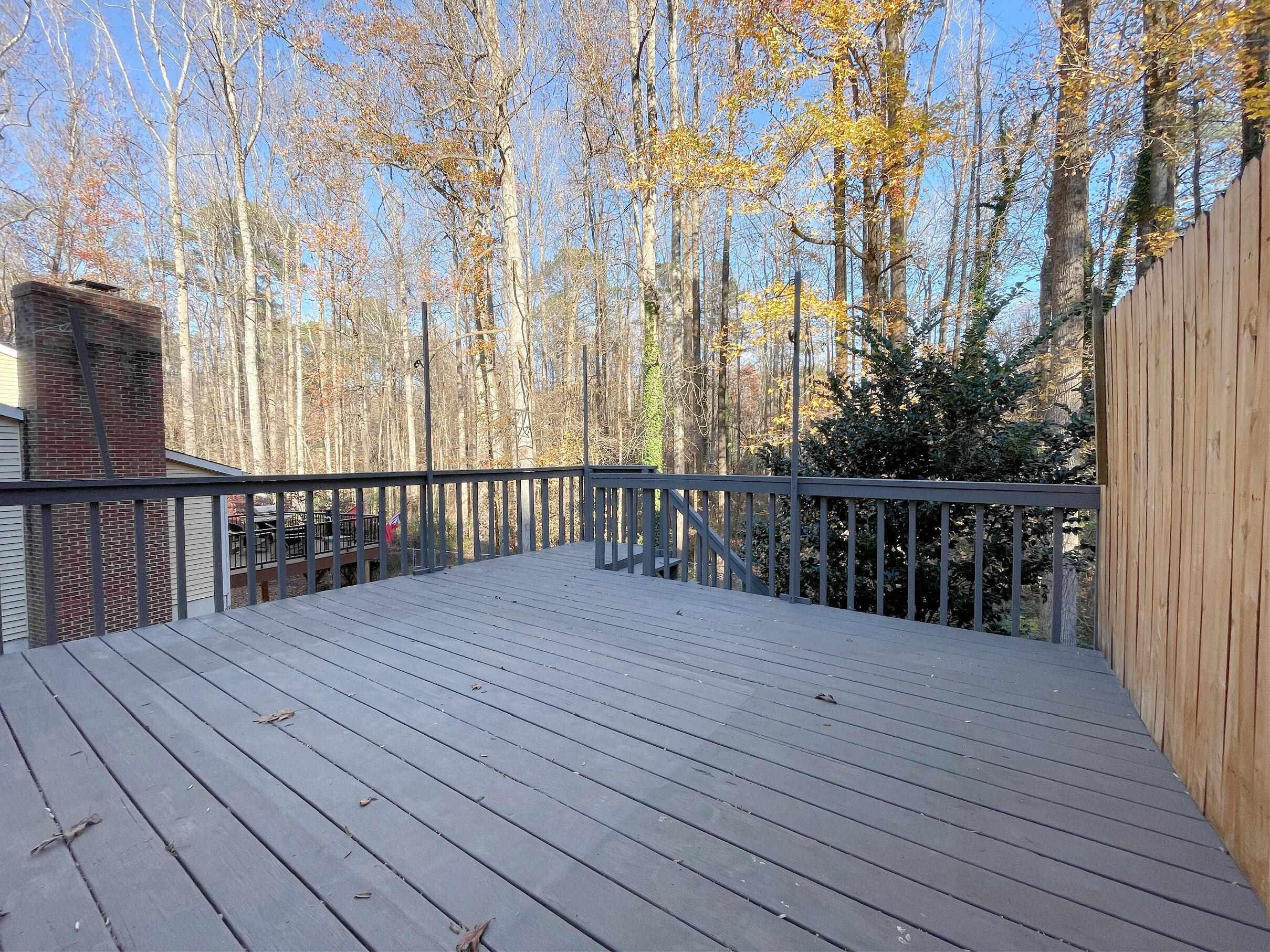 7328 Summerland Drive Raleigh, NC 27612 - Photo 21 of 27 a view of wooden balcony